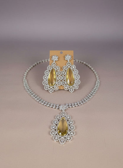 Kurti Connection USA statement necklace set with teardrop yellow stones and clear cubic zirconia in silver tone.