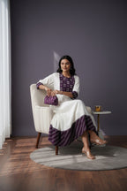 Kurti Connection USA white tiered maxi dress with purple embroidered yoke and cuffs, flowing silhouette.