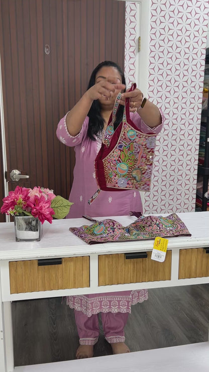 Maroon sleeveless blouse